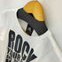 アディダス adidas 袖刺繍 ROCK YOUR CITY フロントプリントクルーネック半袖Tシャツ レディース JPN:M