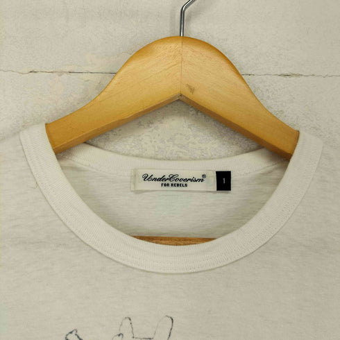 アンダーカバーイズム UNDERCOVERISM THE HOLU RACE GILA Tシャツ メンズ 1