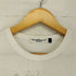 アンダーカバーイズム UNDERCOVERISM THE HOLU RACE GILA Tシャツ メンズ 1