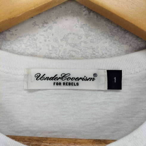 アンダーカバーイズム UNDERCOVERISM THE HOLU RACE GILA Tシャツ メンズ 1