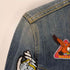 リー Lee バックキャラクターワッペントラッカージャケット レディース import:L