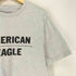 アメリカンイーグルアウトフィッターズ AMERICAN EAGLE OUTFITTERS ロゴプリントTシャツ メンズ L