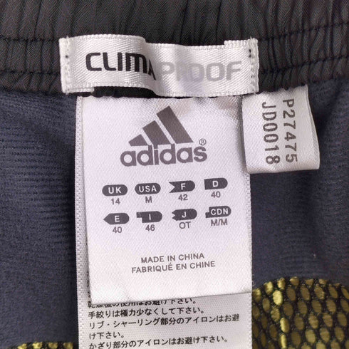 アディダス adidas ロゴプリント バックジップ ナイロンパンツ メンズ OT