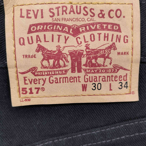 リーバイス Levis 02年製 後染めブラック 517 ブーツカット デニムパンツ サルファブラック メンズ W30 L34