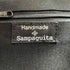 SAMPAGUITA チャーム付 ブリヤシ カゴバッグ レディース