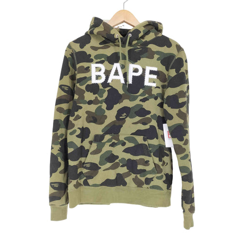 アベイシングエイプ A BATHING APE BAPE 1ST CAMO スワロフスキー プルオーバーパーカー レディース S