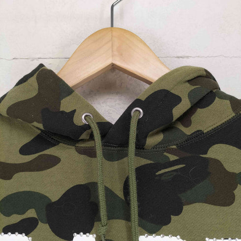 アベイシングエイプ A BATHING APE BAPE 1ST CAMO スワロフスキー プルオーバーパーカー レディース S