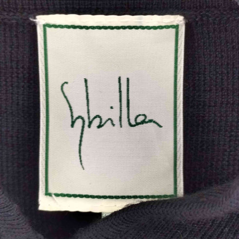 シビラ Sybilla ネックラウンドモチーフニットプルオーバー レディース