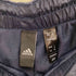 アディダス adidas 24SS スリーストライプス ルーズフィット テーパードレッグ オープンヘム WIND RDY ウインドパンツ メンズ JPN:M
