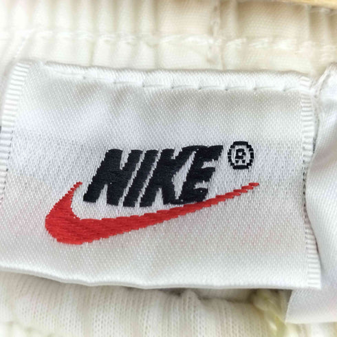 ナイキ NIKE 90S 白タグ スウッシュロゴ刺繍 裾ジップ テーパード イージーパンツ メンズ import:S