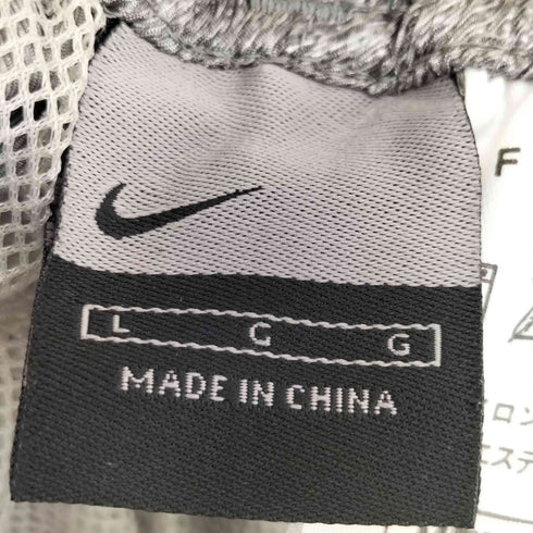 ナイキ NIKE 00S スウッシュロゴ刺繍 裏地メッシュ 裾ジップ ナイロンパンツ メンズ import:L