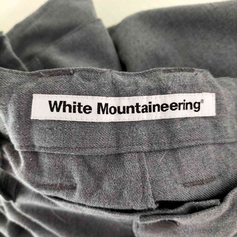 ホワイトマウンテニアリング WHITE MOUNTAINEERING レイヤードポケット テーパードパンツ メンズ JPN:2