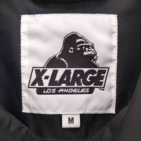 エクストララージ XLARGE コラボ ロゴ キャラクター プリント コーチ ジャケット メンズ JPN:M