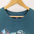 マジェスティック MAJESTIC チームプリント クルーネック 半袖Tシャツ メンズ JPN:L