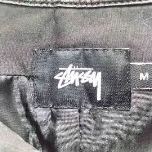 ステューシー Stussy Sロゴ ワッペン レザー パイピング サイドジップ バイカラー チェック スカート レディース M