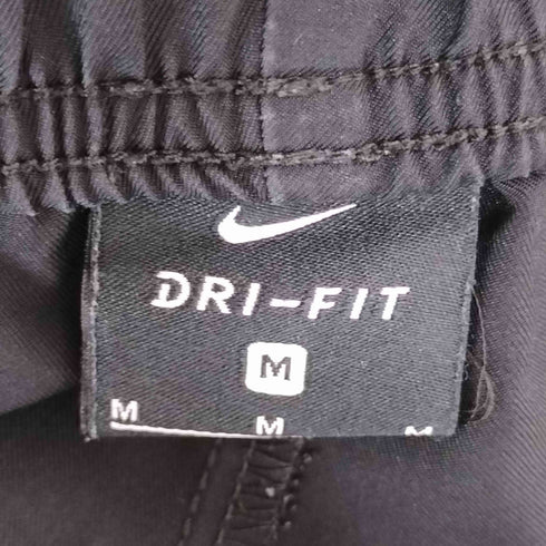ナイキ NIKE DRI-FIT ドライフィット ウィンドブレーカー ウーブンパンツ メンズ JPN:M