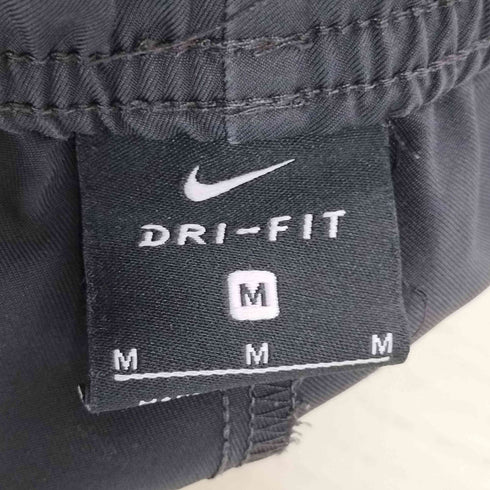 ナイキ NIKE DRI-FIT ドライフィット ウィンドブレーカー ウーブンパンツ メンズ JPN:M