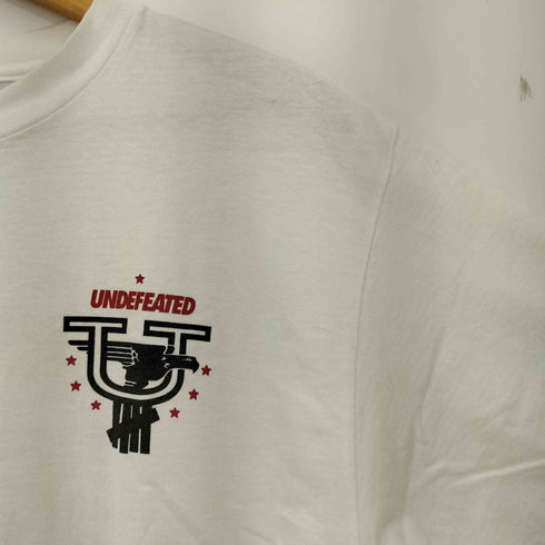 アンディフィーテッド UNDEFEATED NIPPON DIVISION PLAY DIRTY 両面プリント 半袖カットソー メンズ MEDIUM