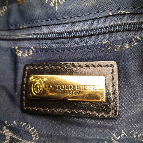 LA TOUR EIFFEL 巾着レザーショルダーバッグ レディース
