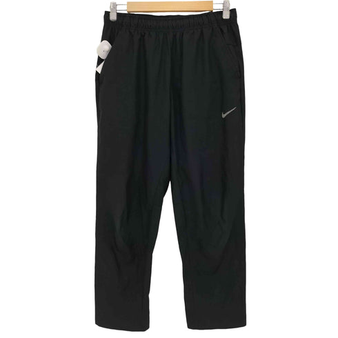 ナイキ NIKE オープンヘムバーサタイルパンツ メンズ L