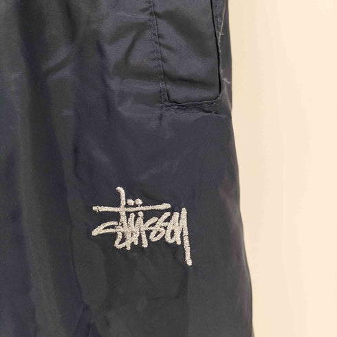 ステューシー Stussy OLD USA製 ショーンフォント リフレクター ナイロントラックパンツ メンズ M