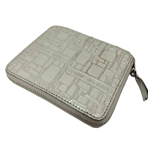 コムデギャルソン COMME des GARCONS SILVER EMBOSSED LOGOTYPE レディース