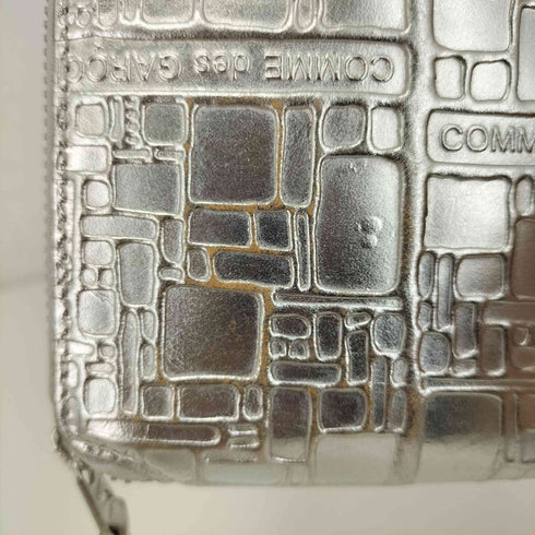 コムデギャルソン COMME des GARCONS SILVER EMBOSSED LOGOTYPE レディース