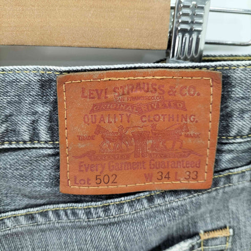 リーバイス Levis 502 フェード ヒゲ ブラックデニムパンツ メンズ 34X33