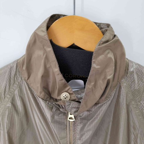 ザコロナユーティリティ THE CORONA UTILITY × HOMBRENINO ナイロン スイングトップ メンズ JPN:M