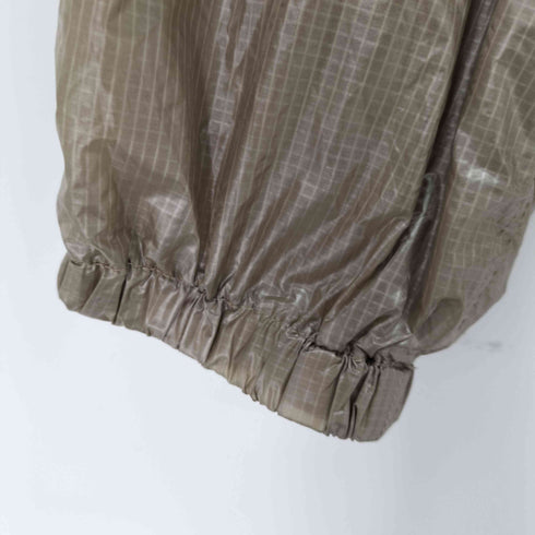 ザコロナユーティリティ THE CORONA UTILITY × HOMBRENINO ナイロン スイングトップ メンズ JPN:M