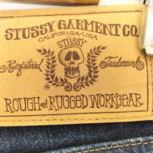 ステューシー Stussy Garment Co. ROUGH & RUGGED WORKGEAR シャネルロゴ ストレートデニム メンズ US:27