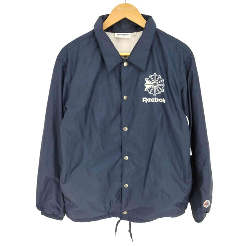 リーボッククラシック REEBOK CLASSIC ロゴ両面プリント 裏地フリース ドローコード コーチ ジャケット メンズ import:M