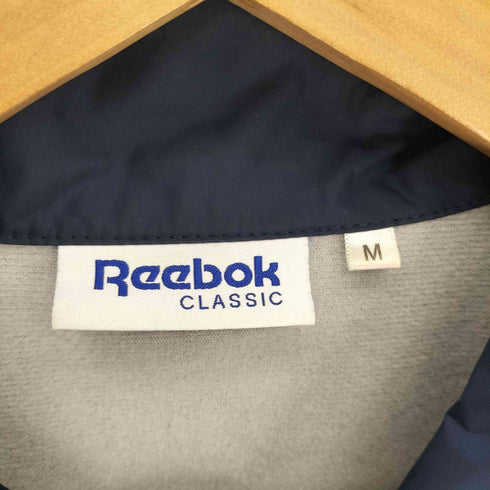 リーボッククラシック REEBOK CLASSIC ロゴ両面プリント 裏地フリース ドローコード コーチ ジャケット メンズ import:M