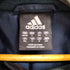 アディダス adidas サッカー エンブレム 中綿 ベンチコート メンズ JPN:M