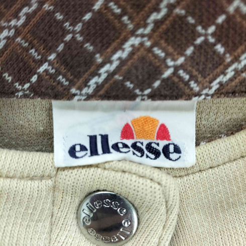 エレッセ ellesse ロゴ刺繍スナップポロシャツ レディース import:M
