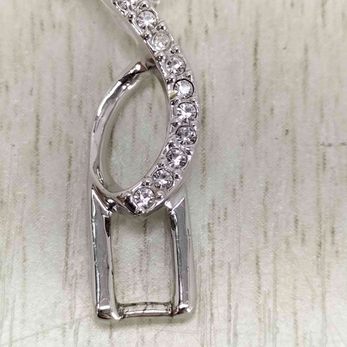 スワロフスキー SWAROVSKI スワロフスキー ツイストデザインペンダントトップ メンズ