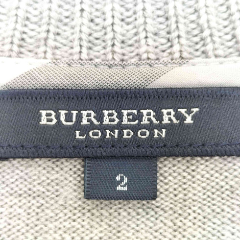バーバリーロンドン BURBERRY LONDON 裾ロゴ 刺繍 ナイロン ウレタン混 Vネック ウールニット レディース JPN:2
