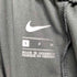 ナイキ NIKE ロゴ刺繍 ワッペン付き サイドライン 切り返し イージーパンツ レディース JPN:S