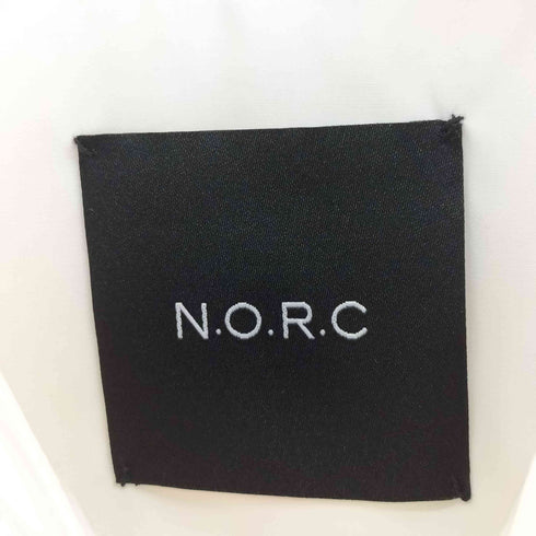 ノーク N.O.R.C バンドカラー ピンタック ラウンド ヘム シャツ レディース JPN:2