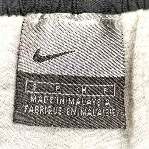 ナイキ NIKE 00s 裾ジップ 裾スウォッシュ サイドライン ナイロントラックパンツ メンズ JPN:S