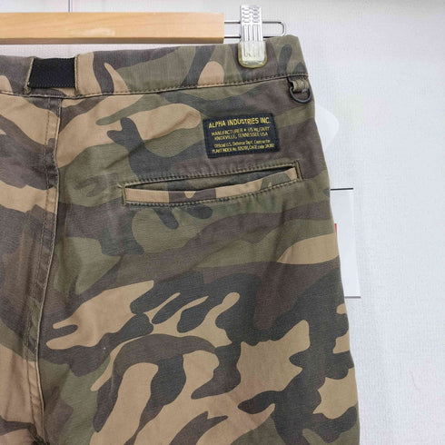 アルファインダストリーズ ALPHA INDUSTRIES 別注 カモ柄テーパードパンツ メンズ JPN:S
