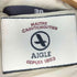 エーグル AIGLE フェイクファー付きフーデッドロングダウンコート レディース 36
