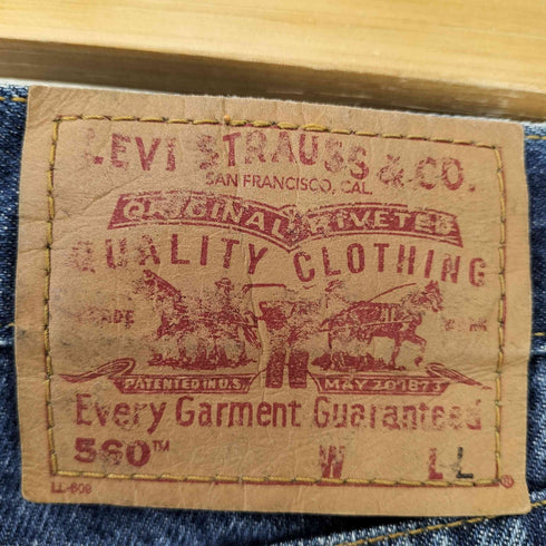 リーバイス Levis 2002年1月製造 560 ボタン裏刻印748 LOOSE FIT STRAIGHT LEG テーパードデニムパンツ メンズ LL