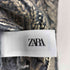 ザラ ZARA KOKILNUSXA TRIKOTAJ METALLIK SVITER レディース