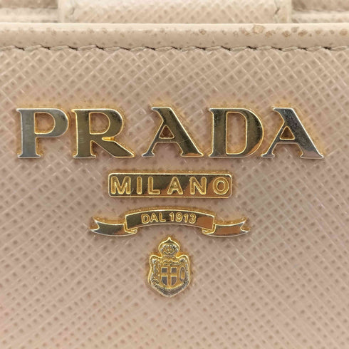プラダ PRADA サフィアーノ 二つ折り ラウンドジップ ウォレット レディース