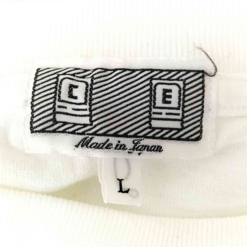 シーイー C.E PRODUCTION UNDER THE GRID T メンズ JPN:L