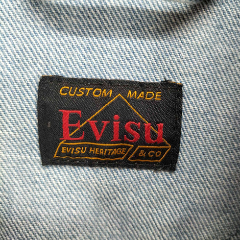 エヴィス EVISU マルチプルバッジのデコンストラクトルーズフィットデニムベスト メンズ import:M