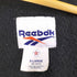 リーボック Reebok 90s USA製 ロゴ刺繍 バックプリント 裏地フリース ナイロン ジャケット メンズ import:XL