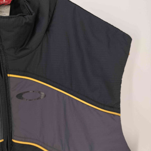 オークリー OAKLEY 90S オーバルロゴ スイッチング パテッドベスト メンズ import:M