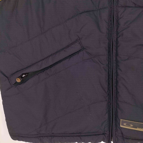 オークリー OAKLEY 90S オーバルロゴ スイッチング パテッドベスト メンズ import:M